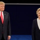 Republican presidential nominee Donald Trump stands next to Democratic presidential nominee Hillary Clinton during the second presidential debate at Washington University in St. Louis, Sunday, Oct. 9, 2016. (AP Photo/Julio Cortez)